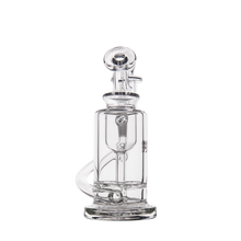 The MJ Arsenal Ursa Mini Dab Rig is a clear borosilicate glass rig featuring a cylindrical base, curved neck, and detailed inner chamber, displayed upright on a plain white background.