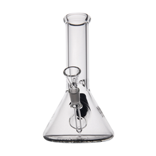 The MJ Arsenal Cache Bong is a clear borosilicate glass beaker bong with a wide base and cylindrical neck. It includes a bowl and downstem attached to the front, shown against a plain white background.
