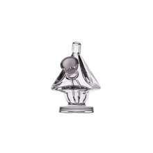 The MJ Arsenal King Bubbler is a clear borosilicate glass piece shaped like a sailboat with a circular ball and loop on top, standing on a round base—an eye-catching, unique blunt bubbler for stylish water filtration.