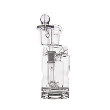 The MJ Arsenal Turbine Mini Dab Rig is a clear borosilicate glass water pipe featuring a cylindrical base, vertical stem, angled mouthpiece, and dome-shaped Inception Turbine Perc, shown against a white background.