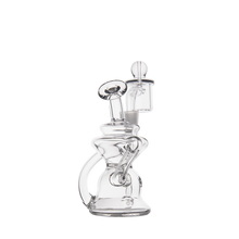 The MJ Arsenal Hydra Mini Dab Rig, featuring clear glass, a bent neck, round base, and quartz banger attachment, is displayed on a plain white background.