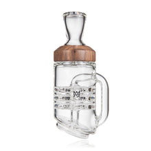 The MJ Arsenal Alpine Series - Halo Peak Top is a clear borosilicate glass mug-inspired water pipe featuring internal percolation, a wood accent around the neck, a side handle, and a front logo—perfect for elevating your setup. Shown on a white background.