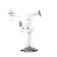 The MJ Arsenal Apollo Mini Dab Rig features a clear borosilicate glass build, unique curved design, wide base, angled mouthpiece, removable bowl, dome-shaped chamber, and a small black logo on the main chamber for preserved flavor.