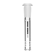 The Human Grade Downstem is a clear glass tube with a frosted stopper, vertical "HUMAN GRADE" text, and three horizontal slits at the bottom. Available as a 10mm water pipe replacement.