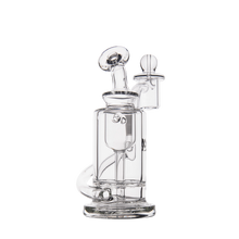 The MJ Arsenal Ursa Mini Dab Rig is a clear borosilicate glass water pipe featuring a round base, cylindrical chamber, angled mouthpiece, and removable bowl, shown against a plain white background.