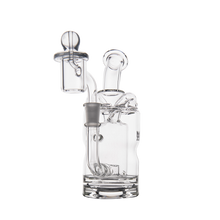 The MJ Arsenal Turbine Mini Dab Rig is a clear borosilicate glass water pipe with a cylindrical base, curved neck, attached bowl, and an Inception Turbine Perc for smooth hits—shown against a plain white background.