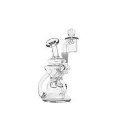 The MJ Arsenal Hydra Mini Dab Rig, featuring clear glass, a cylindrical base, twisted central chamber, angled mouthpiece, attached banger, and carb cap, is displayed against a plain white background.