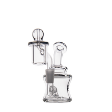 The MJ Arsenal Jammer Mini Dab Rig, featuring borosilicate glass, a bent neck, wide base, and removable carb cap, is displayed against a plain white background.