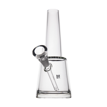 The MJ Arsenal Summit Bong is a clear borosilicate glass piece featuring a cylindrical neck, angled bowl, and triangular base, displayed against a plain white background.