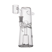 The MJ Arsenal Turret Mini Dab Rig is a clear borosilicate glass rig with a conical base, cylindrical neck, side percolator, and angled mouthpiece—perfect as a portable dab rig for smoking or vaping.