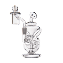 The MJ Arsenal Infinity Mini Dab Rig, made of clear borosilicate glass with multiple chambers, a curved mouthpiece, and a domed nail attachment, is shown photographed on a white background.