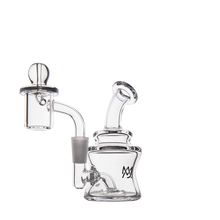 The MJ Arsenal Jammer Mini Dab Rig is a compact clear borosilicate glass piece with a bent mouthpiece, side percolator, and detachable glass banger, shown on a plain white background.