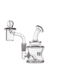 The MJ Arsenal Jammer Mini Dab Rig is a compact borosilicate glass piece with a bent neck, dome-shaped attachment, and engraved logo, shown against a white background.