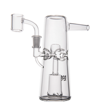 The MJ Arsenal Turret Mini Dab Rig features clear borosilicate glass, a conical base, angled mouthpiece, and an intricate internal percolator, shown against a plain white background.