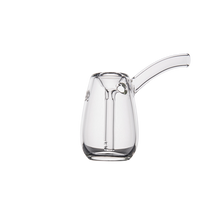 A clear borosilicate glass pitcher with a rounded body and long, curved spout, displayed on a white background, echoes the elegant design of the MJ Arsenal Bulb Bubbler.