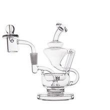 The MJ Arsenal Claude Mini Dab Rig, featuring clear glass, multiple chambers, a bent mouthpiece, round base, and removable dome, is displayed against a plain white background.