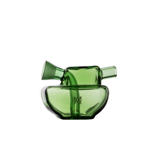 The MJ Arsenal Commander Blunt Bubbler is a modern mini bubbler made of green borosilicate glass with a compact artistic design and two angled mouthpieces, shown against a plain white background.