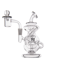 The MJ Arsenal Infinity Mini Dab Rig is a clear borosilicate glass rig with twisting chambers, a round base, side mouthpiece, and features a black crown logo on the front.