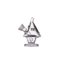 The MJ Arsenal King Bubbler is a clear borosilicate glass pipe shaped like a small house or teepee. It features water filtration, a wide base, angled mouthpiece, and a black geometric logo on the front, shown against a white background.