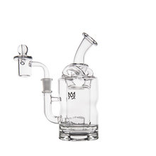 The MJ Arsenal Turbine Mini Dab Rig features clear borosilicate glass, a curved mouthpiece, side percolator, and thick base. It has a small black logo on the body and is set against a plain white background.