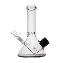 The MJ Arsenal Cache Bong is a clear borosilicate glass beaker-style mini bong with a wide base, angled mouthpiece, and removable bowl—perfect for smooth sessions, shown against a plain white background.