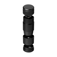 An exploded view of the MJ Arsenal Capsule Grinder Dugout, a black cylindrical device with five threaded components stacked vertically, highlights its compact design and internal structure as an efficient herb grinder.