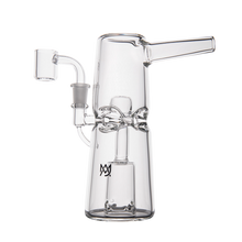 The MJ Arsenal Turret Mini Dab Rig is a portable clear borosilicate glass piece with a side bowl, angled mouthpiece, cylindrical base, and detailed internal design—perfect for on-the-go sessions.