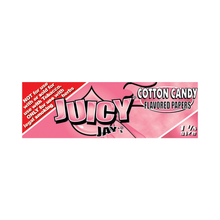 A pink pack of Juicy Jay's Flavored Papers in Cotton Candy flavor, 1 1/4 size, marked "not for tobacco use." Features triple-dipped flavoring for sweetness and a playful cotton candy graphic.