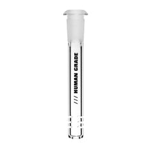 The Human Grade Downstems—a clear glass tube with stopper and bold "HUMAN GRADE" label—stands upright on a white background, perfect as a precise water pipe replacement or for use with a 14mm downstem.