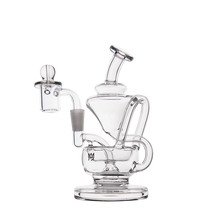 The MJ Arsenal Claude Mini Dab Rig is a clear glass recycler with curved tubes, a wide base, and an angled mouthpiece for smoking or vaporizing, shown against a plain white background.