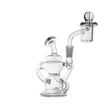 The MJ Arsenal Hydra Mini Dab Rig is a clear glass Klein recycler with a bent neck, round base, attached bowl piece, and MJ logo on the side, shown against a plain white background.