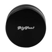 A black, round aluminum BIGFUN! Medium 2pc Grinder lid with ridged edges and "Big Fun!" in playful white script on top, viewed from above against a white background.