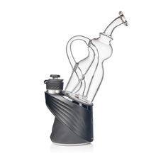 The MJ Arsenal Lasso Puffco Peak Top is a modern borosilicate glass attachment with a curved neck and handle, designed for use with the sleek black Puffco Peak base to vaporize concentrates efficiently.