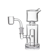 The MJ Arsenal Column Mini Dab Rig, made of clear borosilicate glass, showcases a cylindrical chamber, side percolator, bent neck, and 10mm quartz banger attachment on a white background.