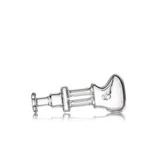 The MJ Arsenal Tetra, a clear borosilicate glass hand pipe with a curved bowl and cylindrical stem, lies horizontally on a white background, highlighting its modern and sleek design.