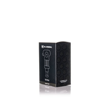 A black and white box labeled MJ Arsenal Tetra stands upright on a white background, displaying a line drawing of this modern pipe and a pattern of circular MJ Arsenal logos.