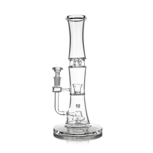 The MJ Arsenal Spire Glass Water Pipe is a clear borosilicate bong with a cylindrical neck, wide base, and side 14mm flower bowl attachment, shown upright on a white background.