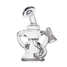 The MJ Arsenal Hydra Vape Edition is a clear glass mini dab rig with a unique curvy design, side chamber, and mouthpiece, plus a black logo on the base. Compatible with vaporizer pen adapters for extra versatility.
