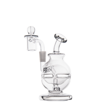 The MJ Arsenal Royale Mini Dab Rig is a clear borosilicate glass piece featuring a round chamber, angled mouthpiece, flat base, and side arm with bowl and carb cap, displayed on a plain white background.