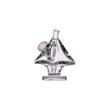 The MJ Arsenal King Bubbler is a clear borosilicate glass water pipe featuring a sailboat shape, round base, angled mast, and hollow body. It is designed for water filtration and is photographed on a white background.