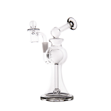 The MJ Arsenal Apollo Mini Dab Rig, made from clear borosilicate glass, is shown upright on a plain white background. It features a wide base, curved neck, and glass bowl for optimal flavor preservation.