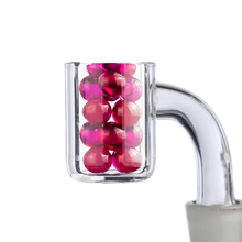 The MJ Arsenal Ruby Terp Pearls (6mm) are shiny ruby pearls designed to be arranged in your glass pipe or banger, adding a unique and eye-catching touch to your accessories collection.