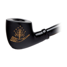 The Lord Of The Rings Pipes features a black pipe with a gold emblem of a stylized tree, seven stars, and a curved horn on the bowl. Inspired by Tolkien, it's presented on a white background—an ideal collector's edition gift box item.
