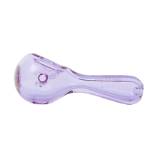 The Ric Flair Drip Spoon Pipe is a translucent light purple spoon pipe made from borosilicate glass, with a rounded bowl and cylindrical stem, shown against a white background.