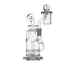 The MJ Arsenal Ursa Mini Dab Rig is a clear borosilicate glass rig featuring a cylindrical base, bent neck, and quartz banger with a round carb cap, shown photographed on a white background.