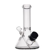 The MJ Arsenal Cache Bong is a clear borosilicate glass beaker with a wide base, straight neck, black mouthpiece, and matching black bowl. Shown on a plain white background for a sleek, modern appearance.