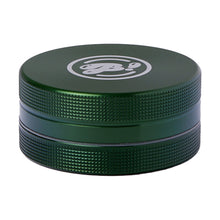 The BIGFUN! Medium 2pc Grinder is a green, round aluminum grinder with textured sides, sharp diamond teeth, and a white stylized B logo on top, displayed against a white background.