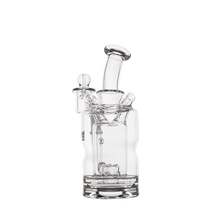 The MJ Arsenal Turbine Mini Dab Rig is a clear borosilicate glass water pipe featuring a curved neck, cylindrical body, and attached bowl with an Inception Turbine Perc design, shown on a white background.