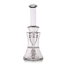 The MJ Arsenal Bloopcycler Dab Rig, featuring a clear glass build with a cylindrical neck, curved midsection, and wide base, is designed to elevate your dabbing experience and is showcased against a white background.