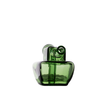 The MJ Arsenal Commander Blunt Bubbler is a modern, green borosilicate glass piece with a geometric, abstract design and a tilted cylindrical neck, displayed against a plain white background.